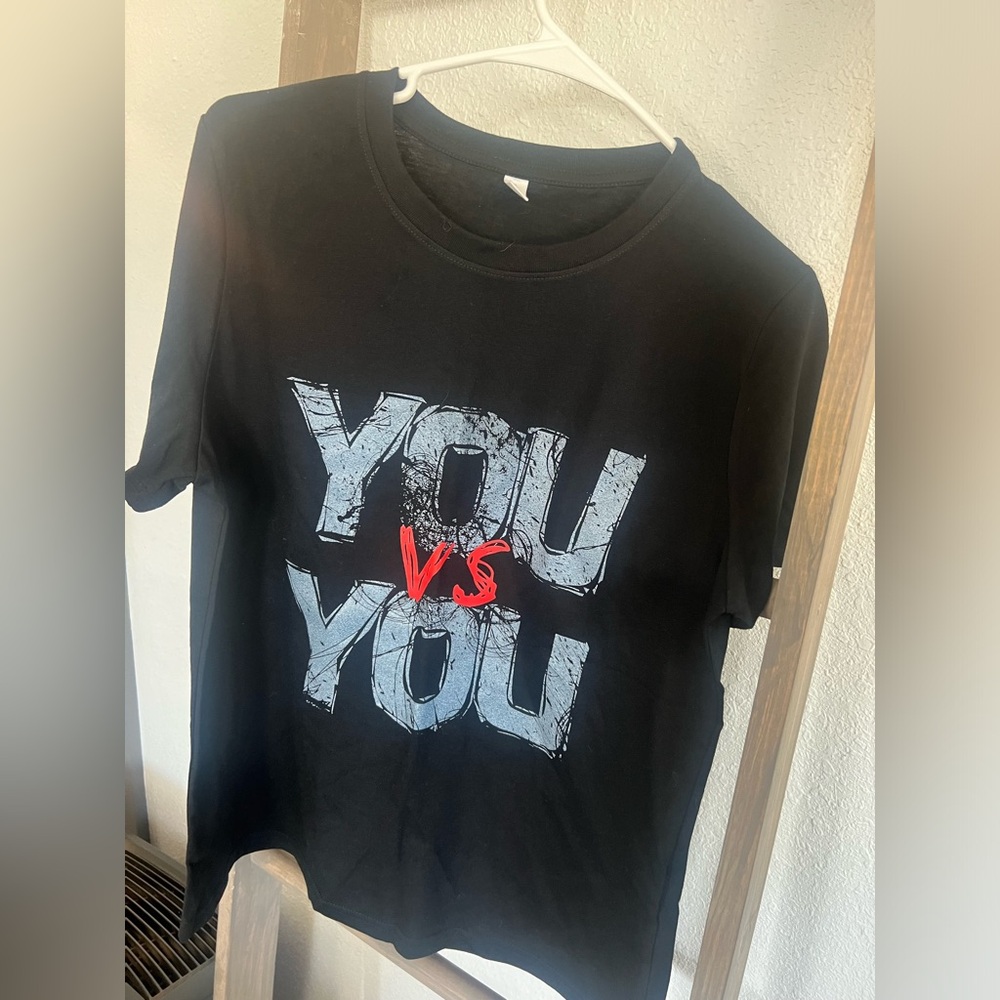 Black crew neck t-shirt, never worn, size L